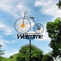 iron welcome sign bicycle shape